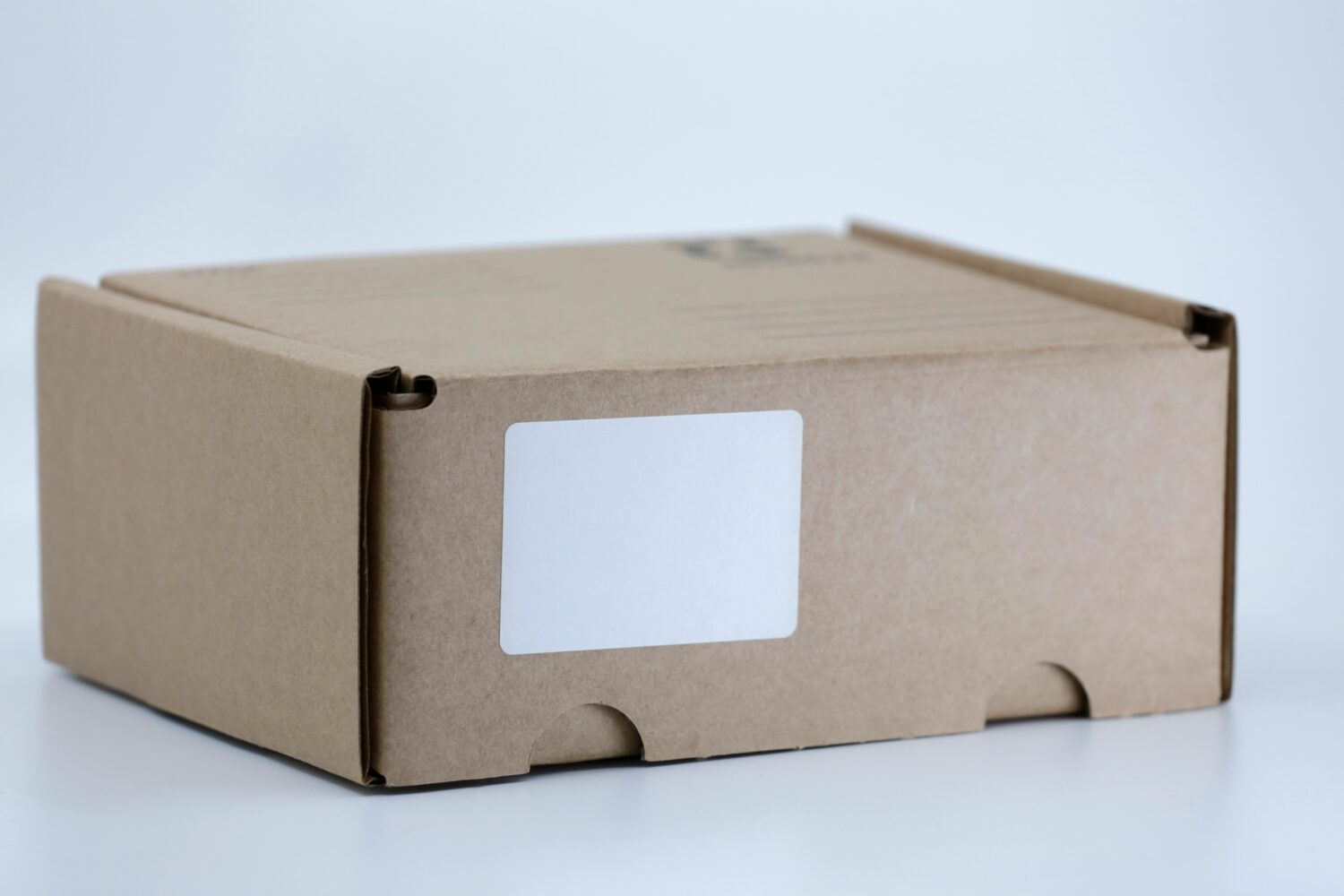 Image of ecommerce return box with altered shipping and how to prevent FTID fraud